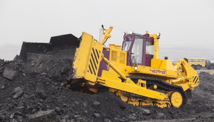Earthmoving equipment at an industrial work site